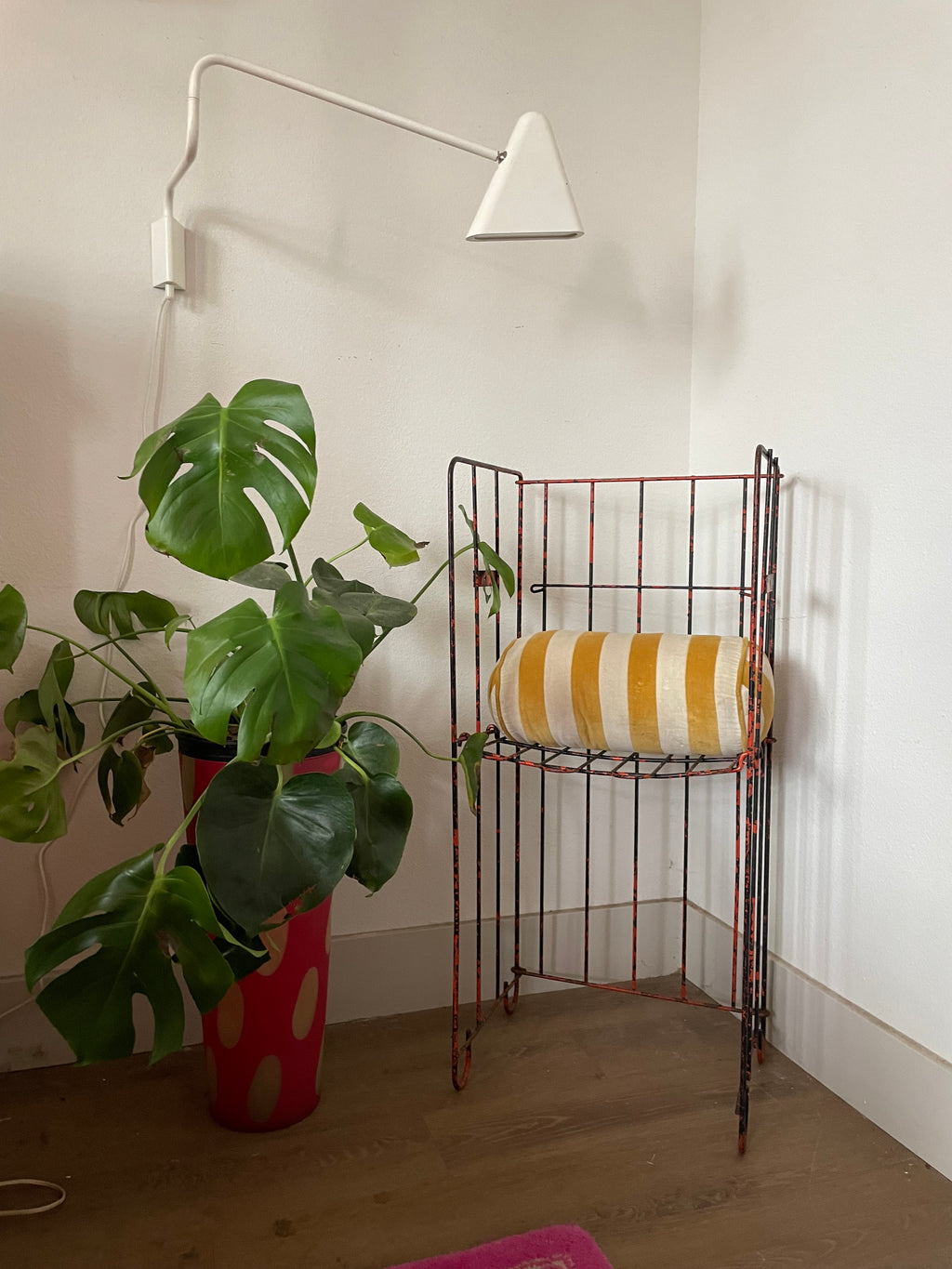 salvage metal magazine rack that is also a chair
