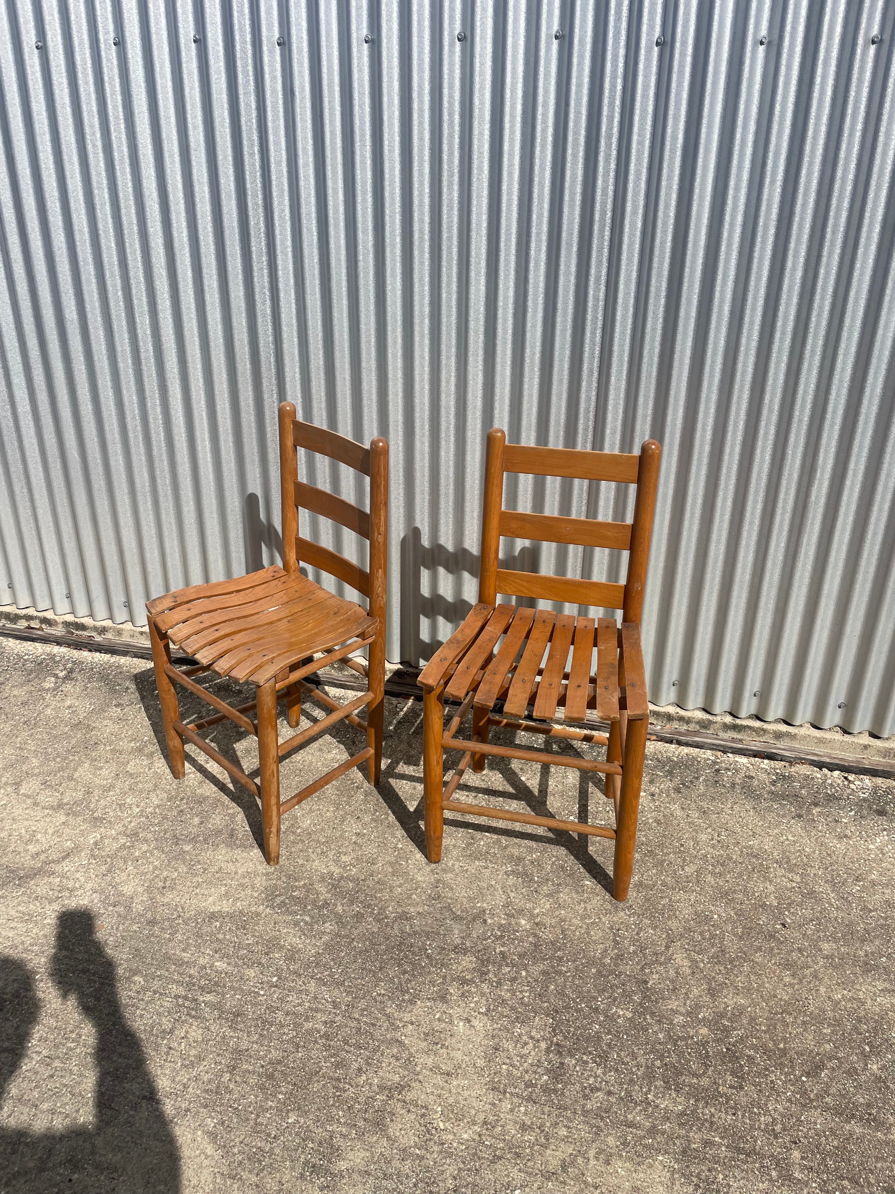 pair of classic farmhouse wooden dining chairs