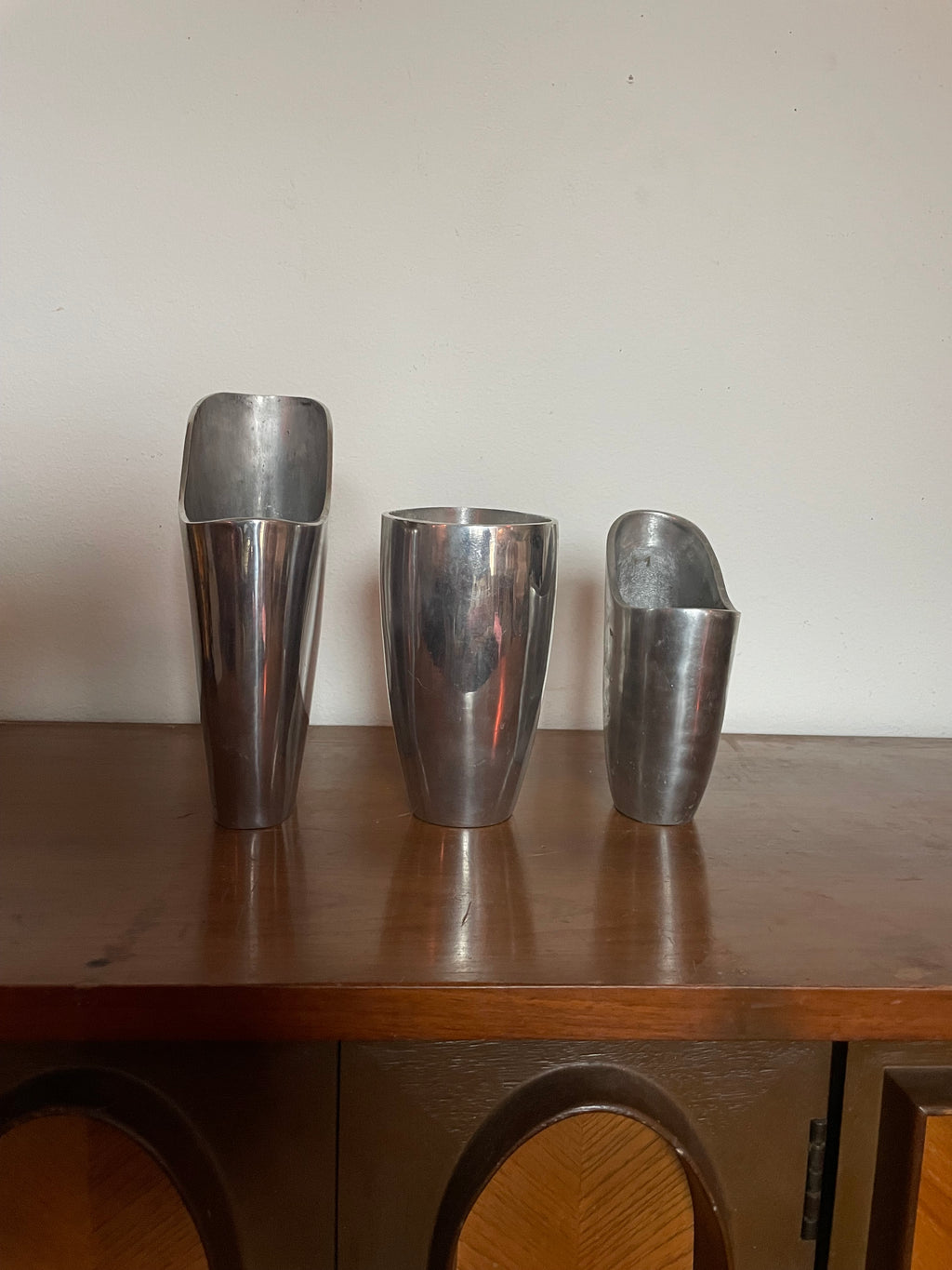 three aluminum vessels