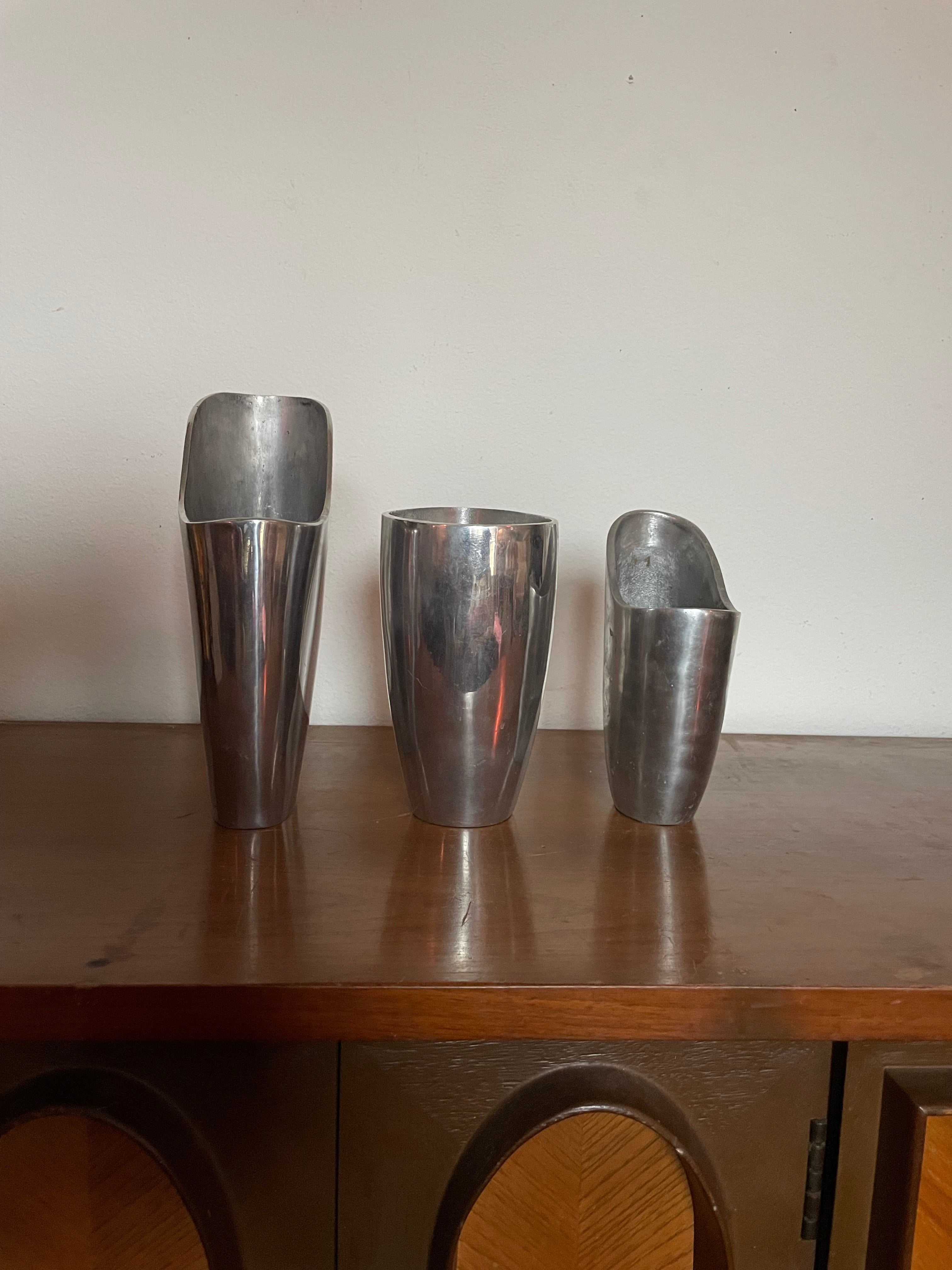 three aluminum vessels