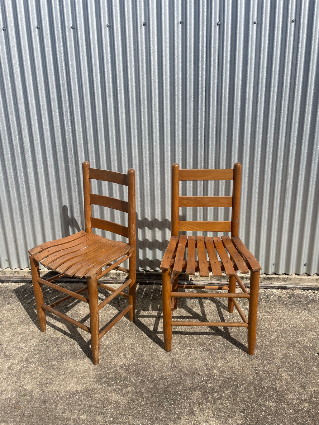 pair of classic farmhouse wooden dining chairs