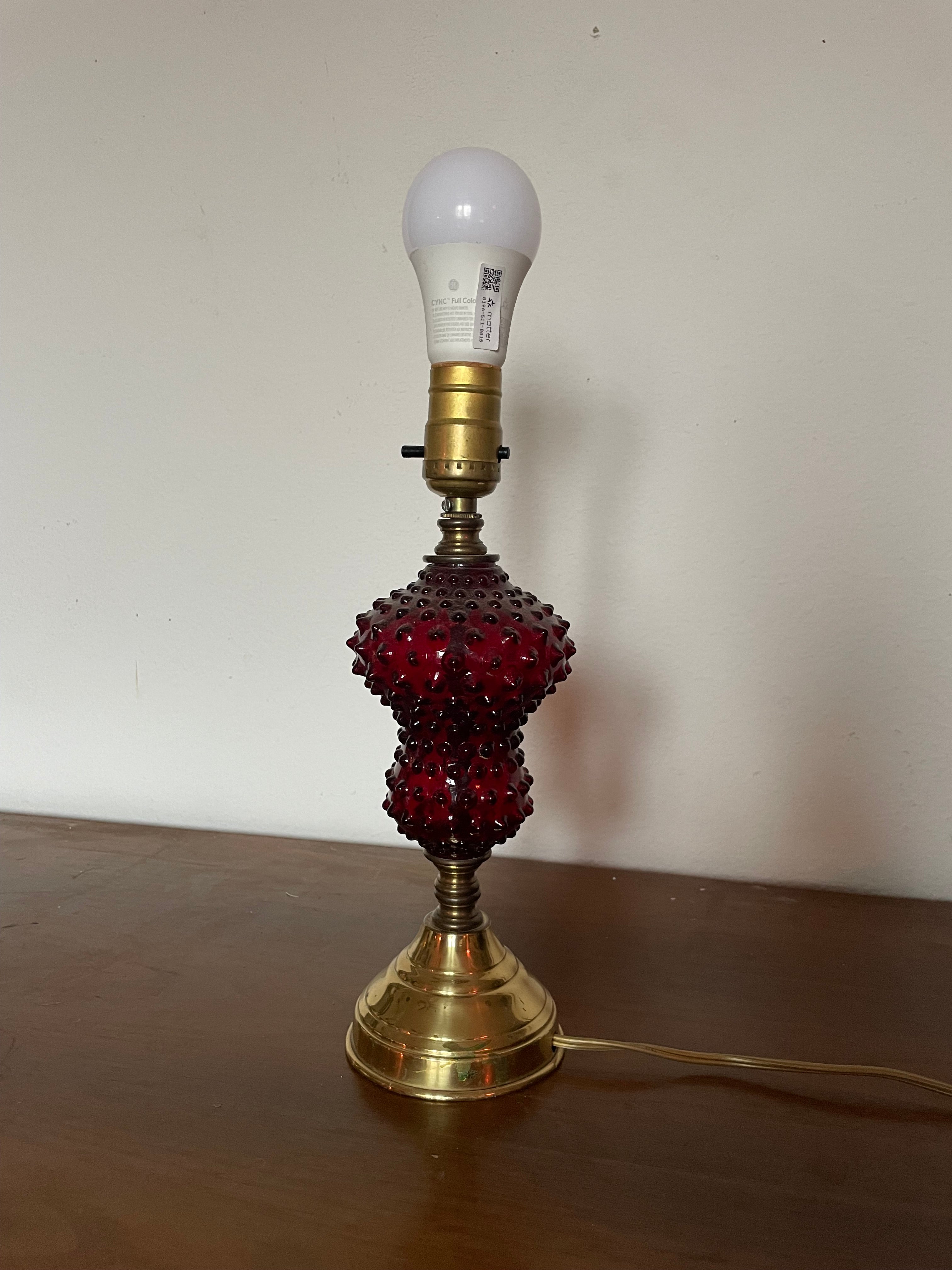 ruby glass and gold table lamp