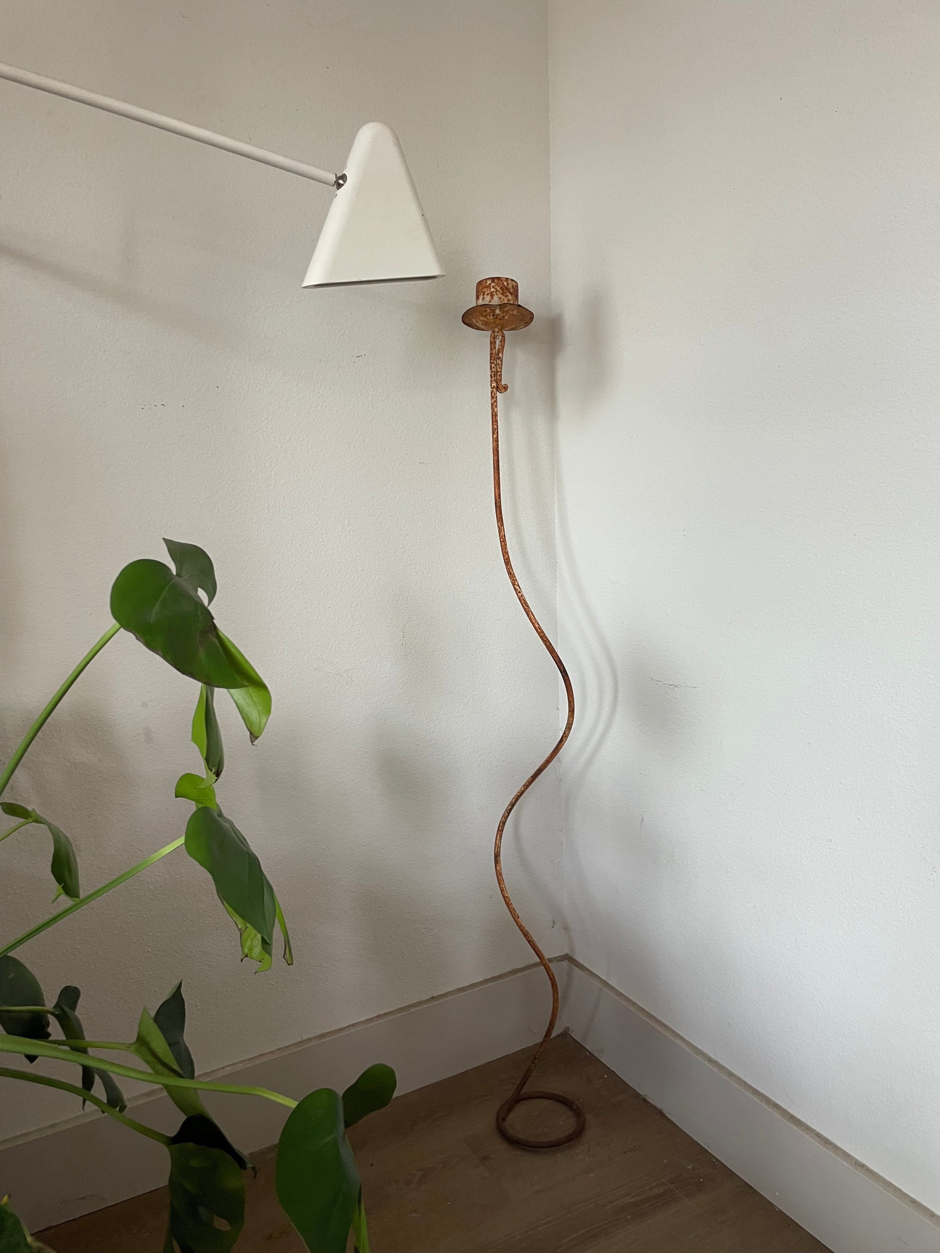 sculpture: iron candlestick and vintage filter