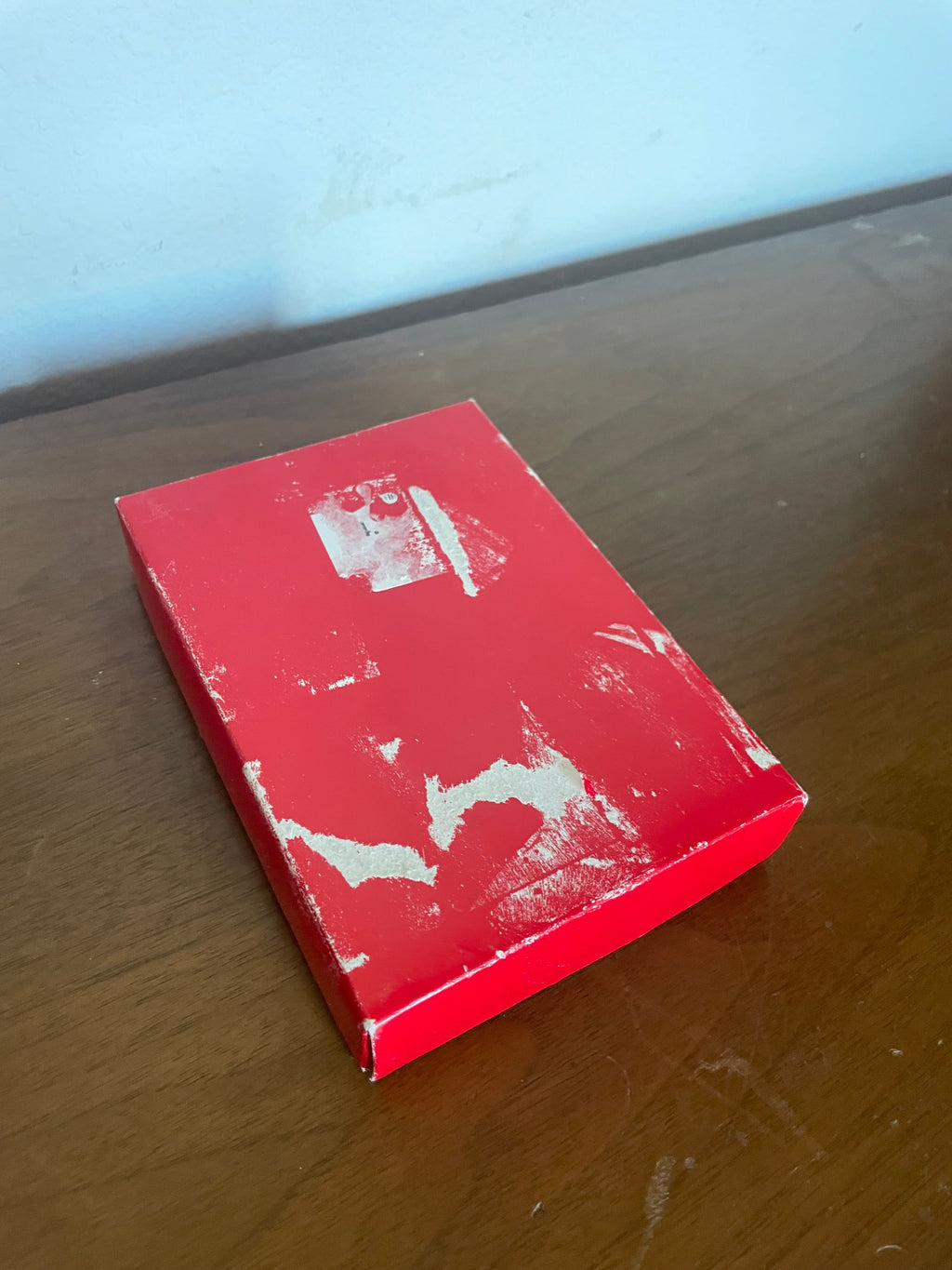 six brass and wooden tea spoons in cheap red box