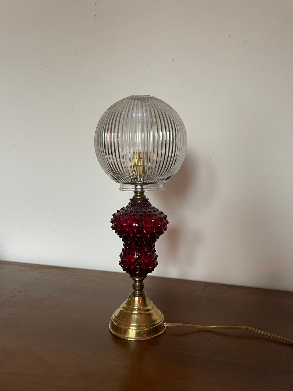 ruby glass and gold table lamp