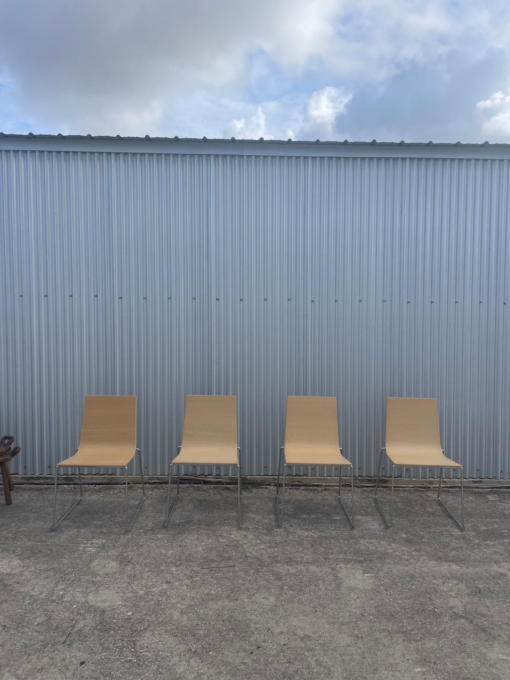 four dining chairs by andreu world