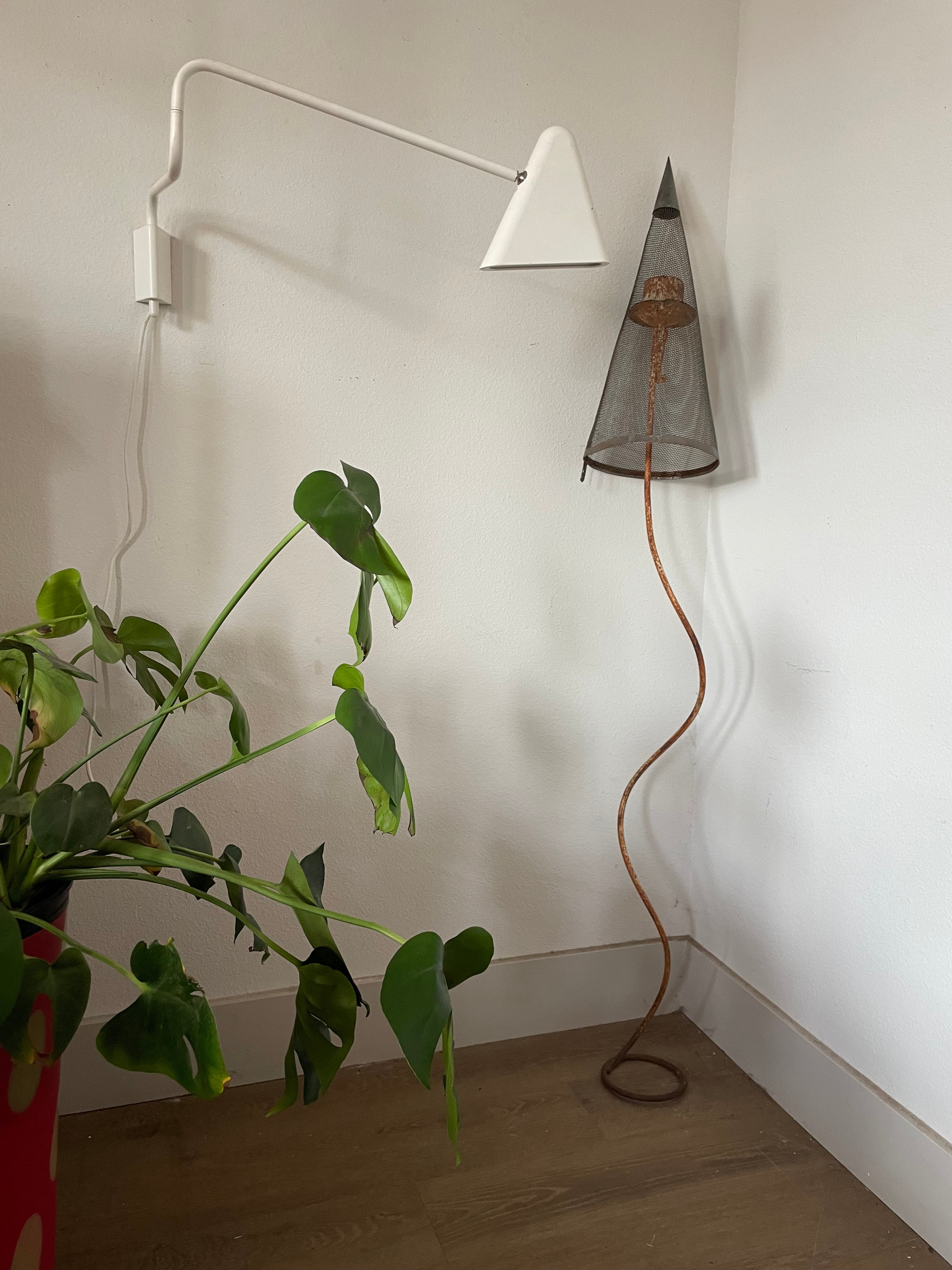 sculpture: iron candlestick and vintage filter