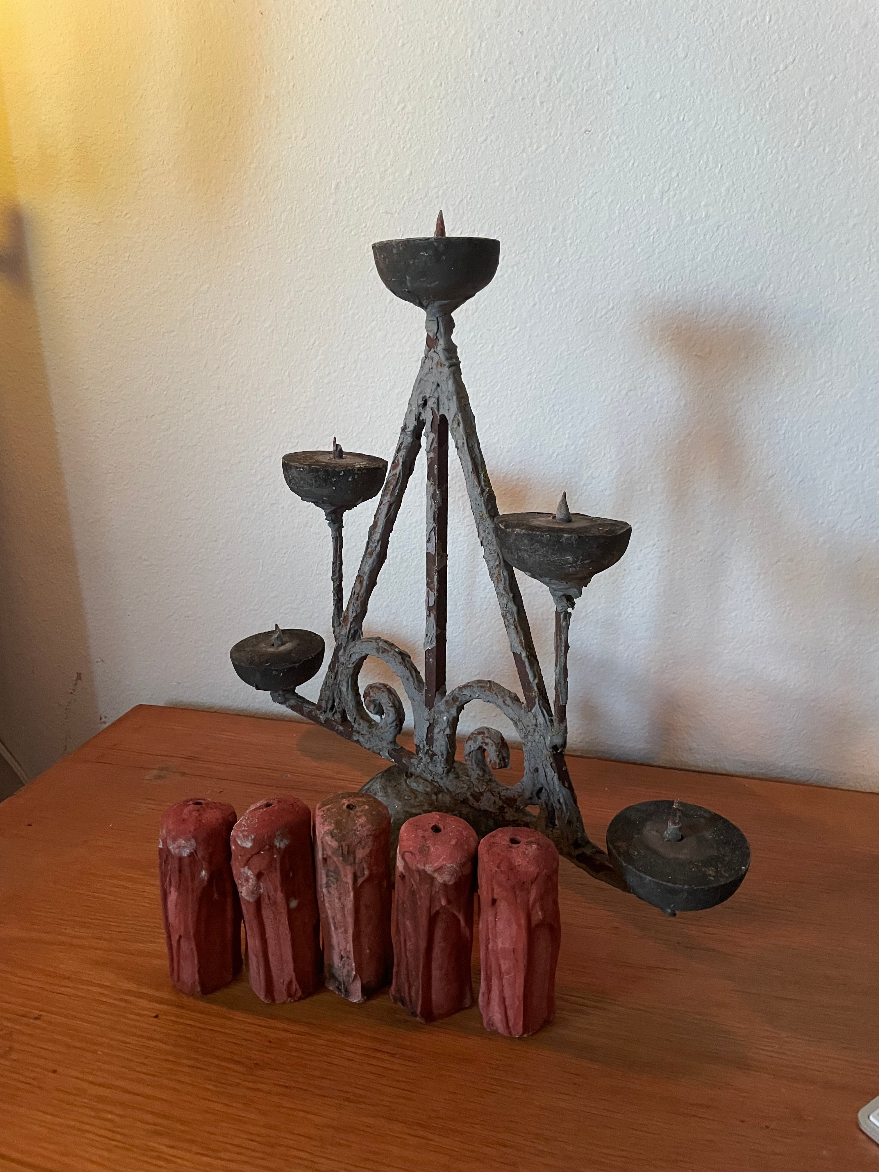 really weird but cool candelabra with five candle figures
