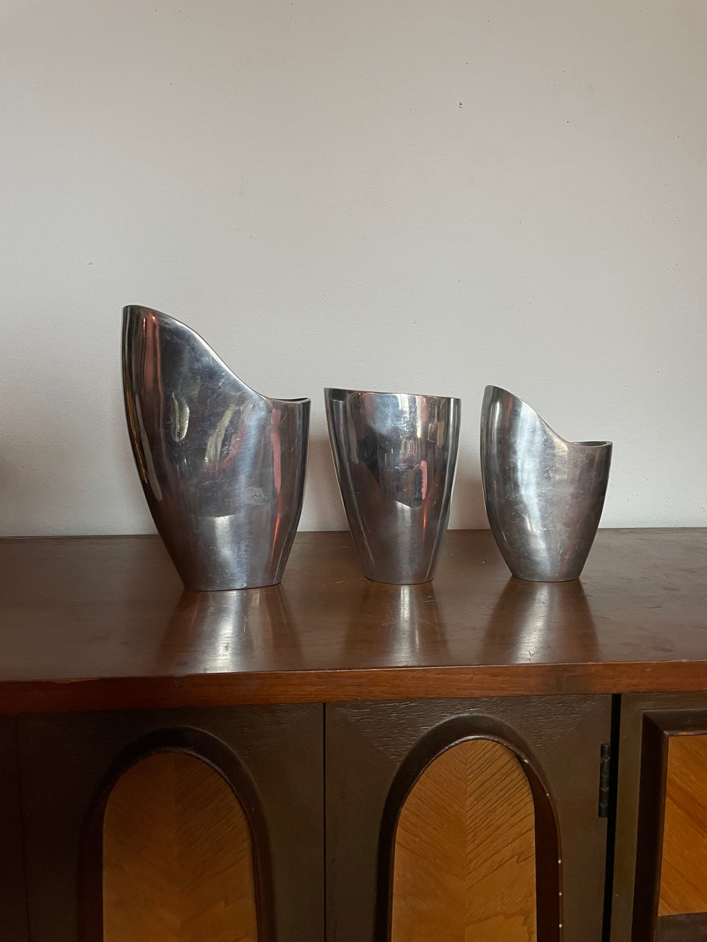 three aluminum vessels