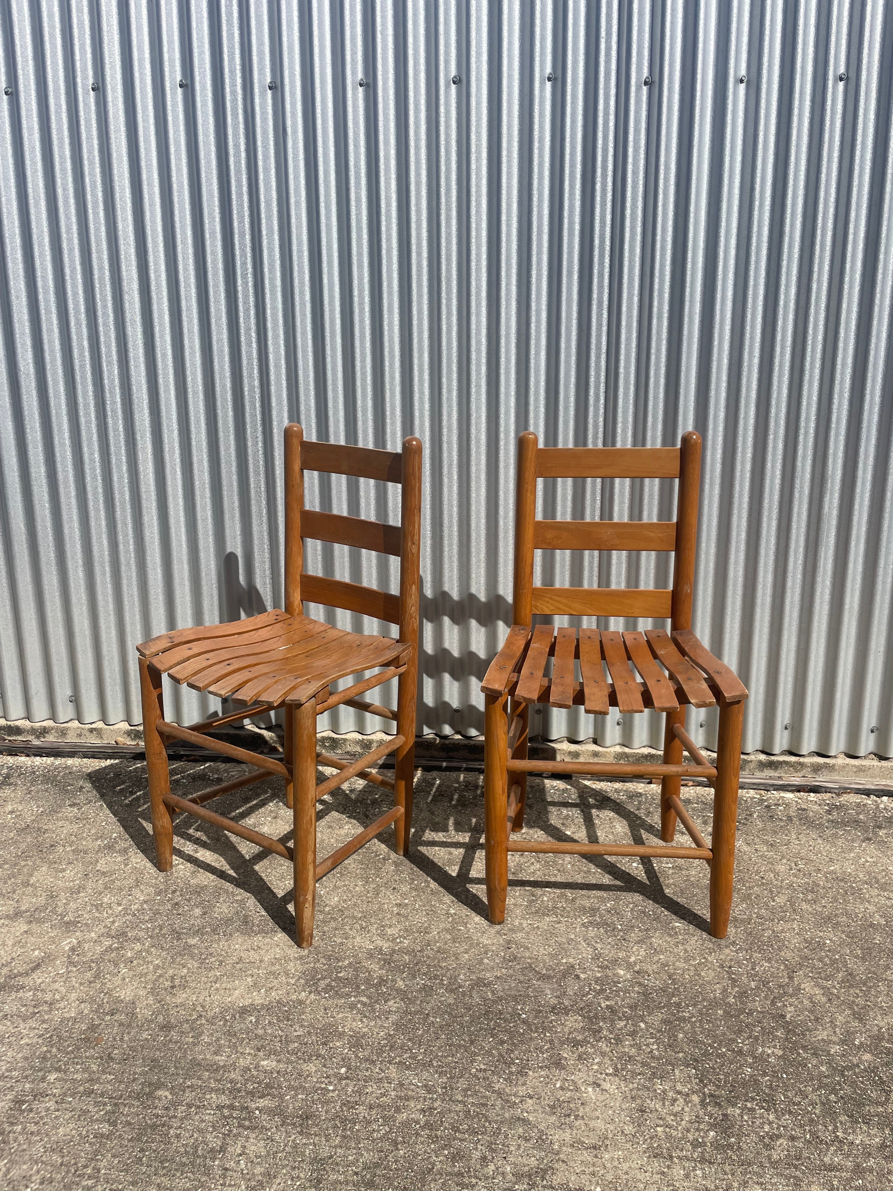 pair of classic farmhouse wooden dining chairs