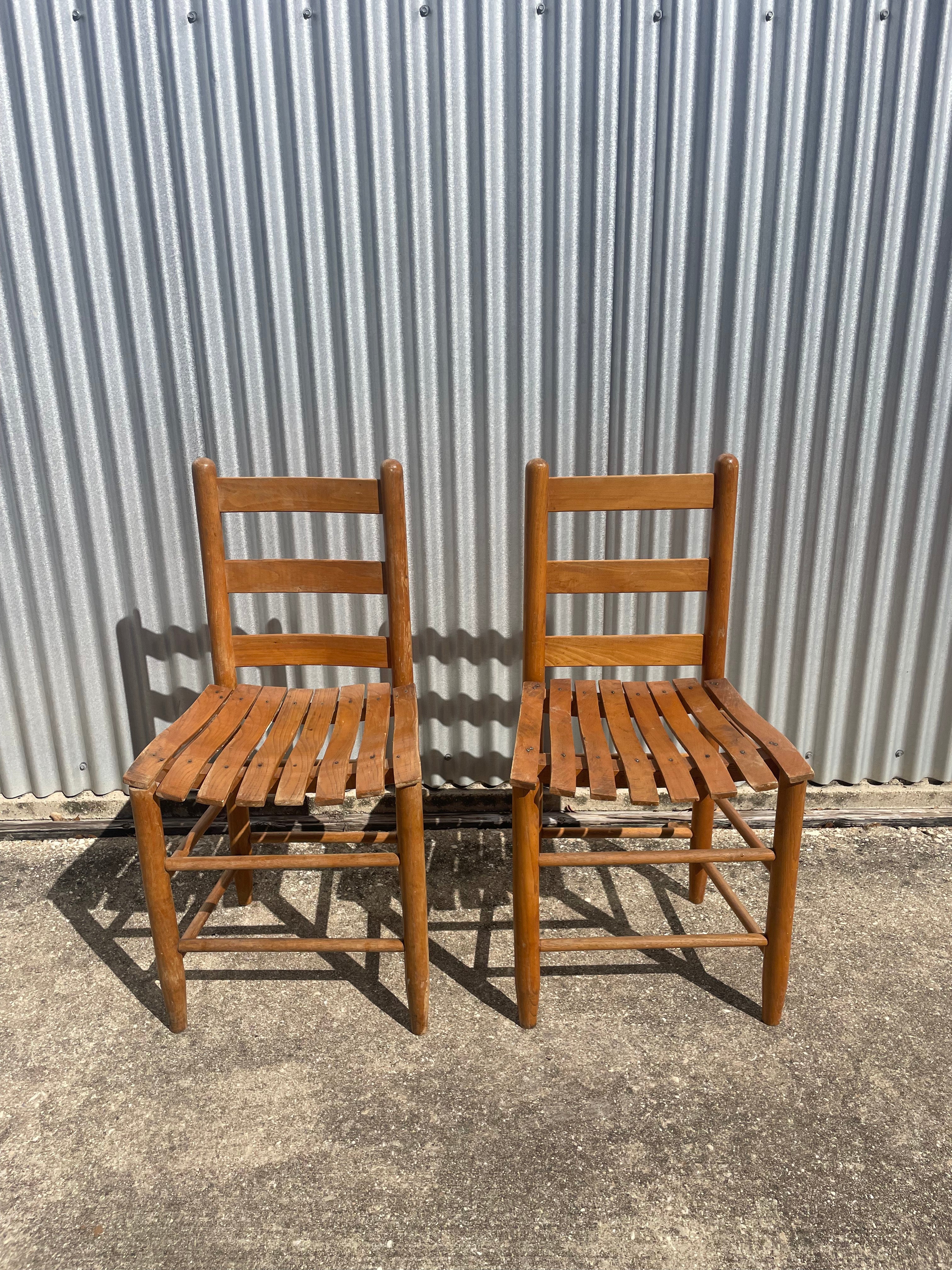 pair of classic farmhouse wooden dining chairs