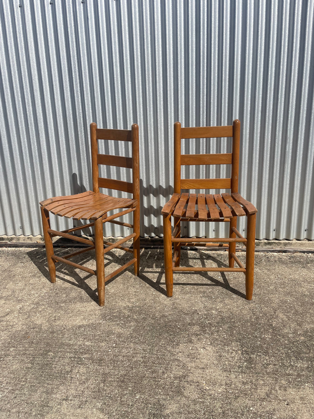 pair of classic farmhouse wooden dining chairs