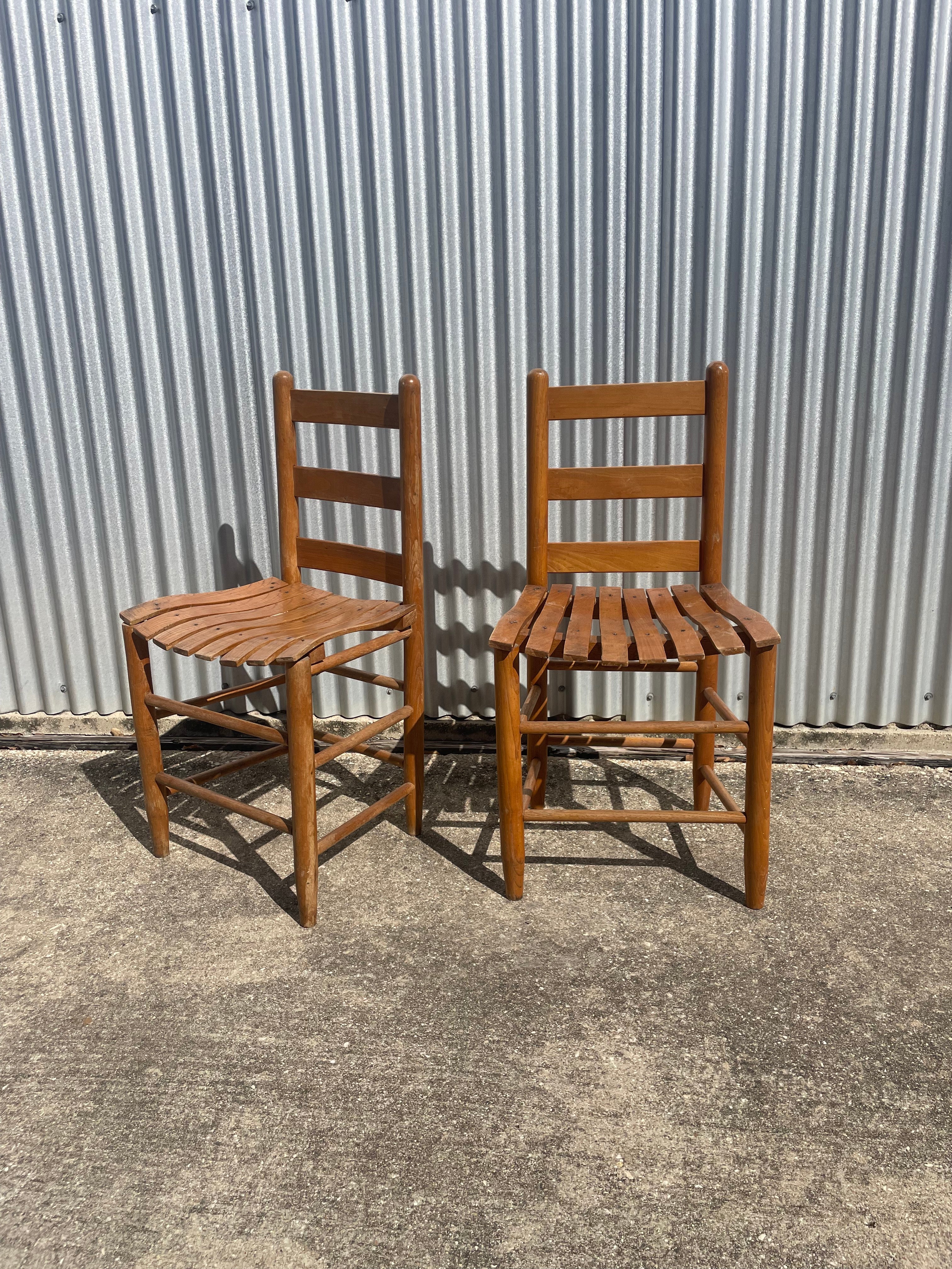 pair of classic farmhouse wooden dining chairs