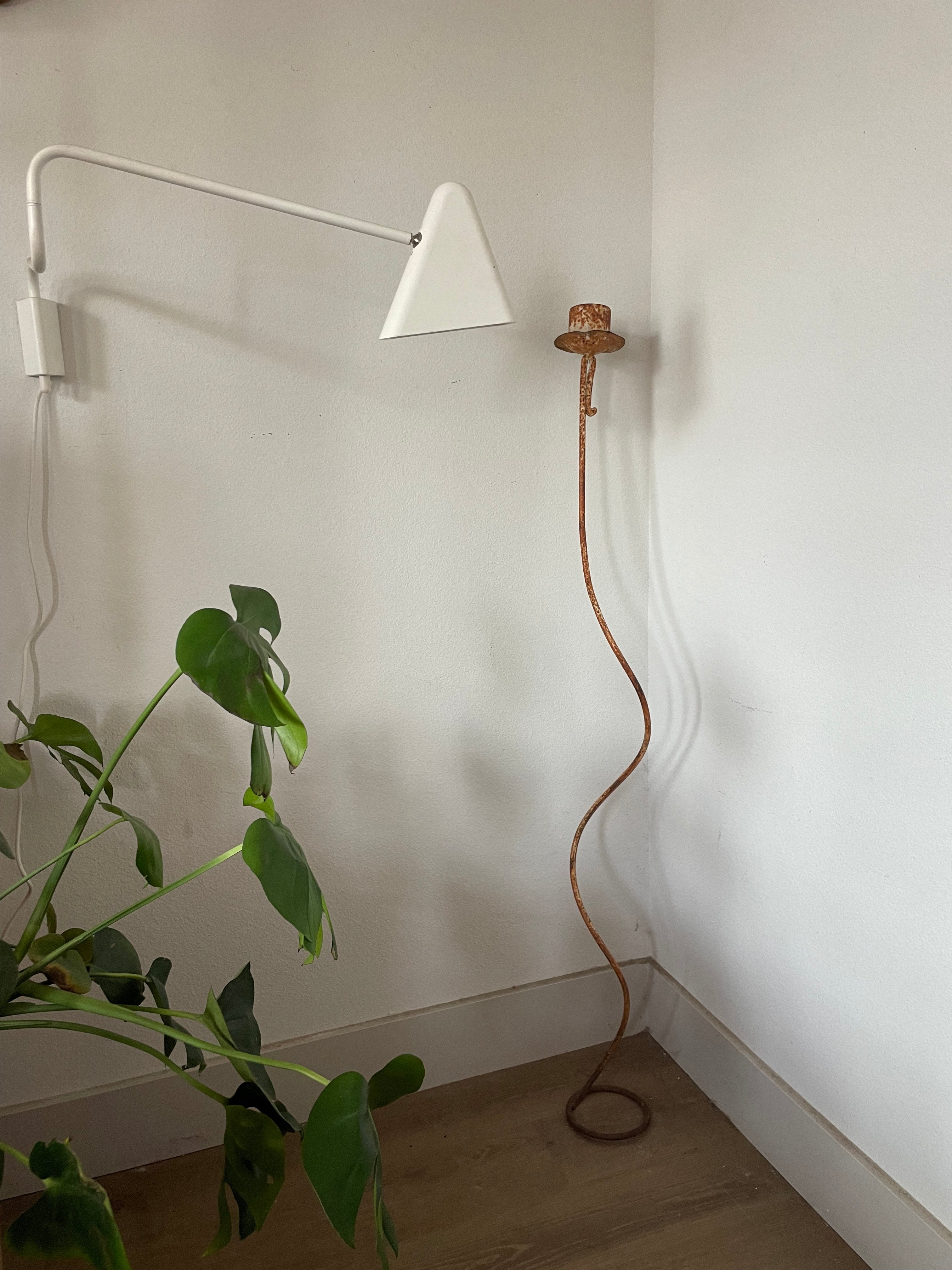 sculpture: iron candlestick and vintage filter