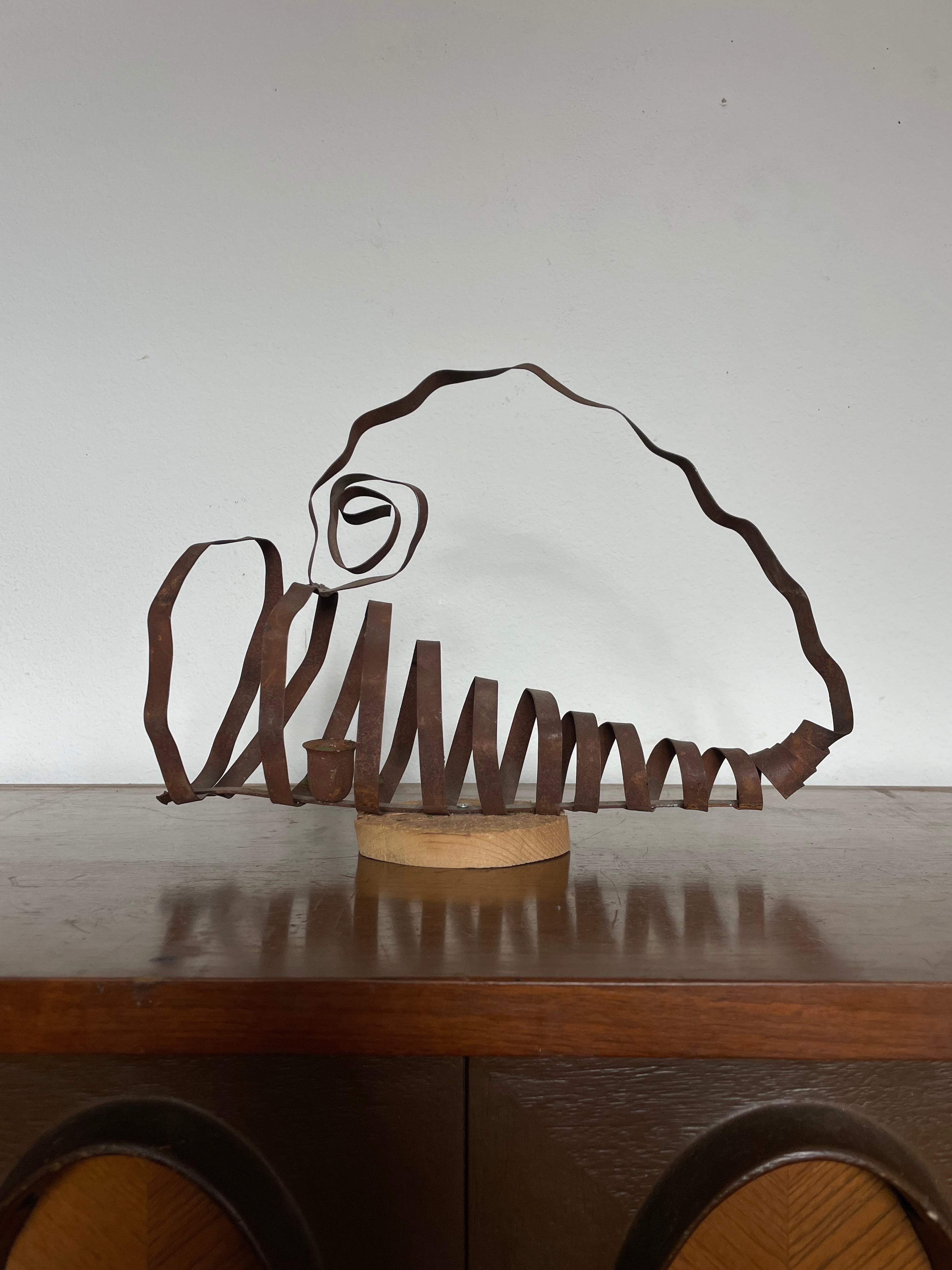 "weird girl" rusted tin sculpture candlestick