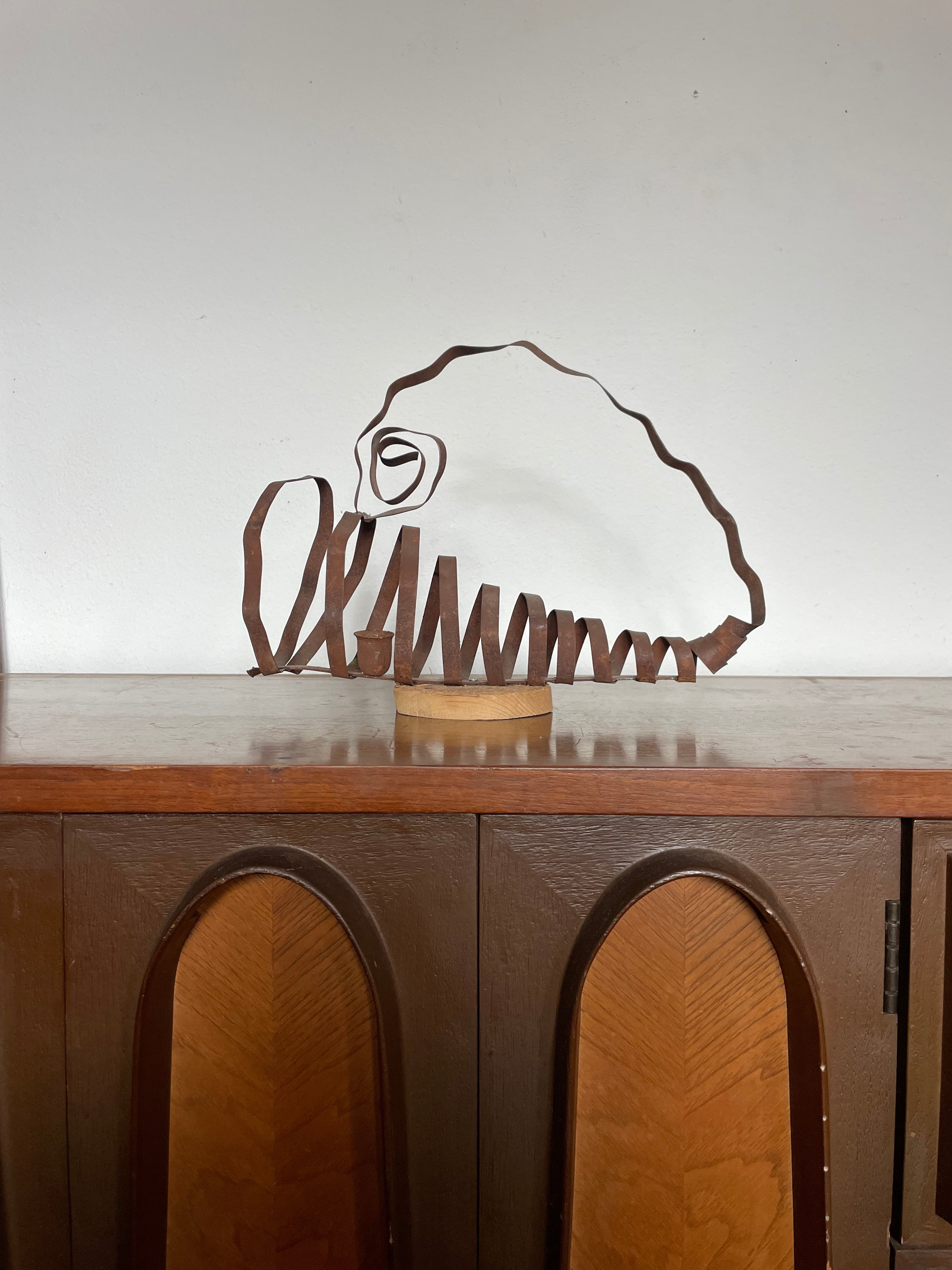 "weird girl" rusted tin sculpture candlestick